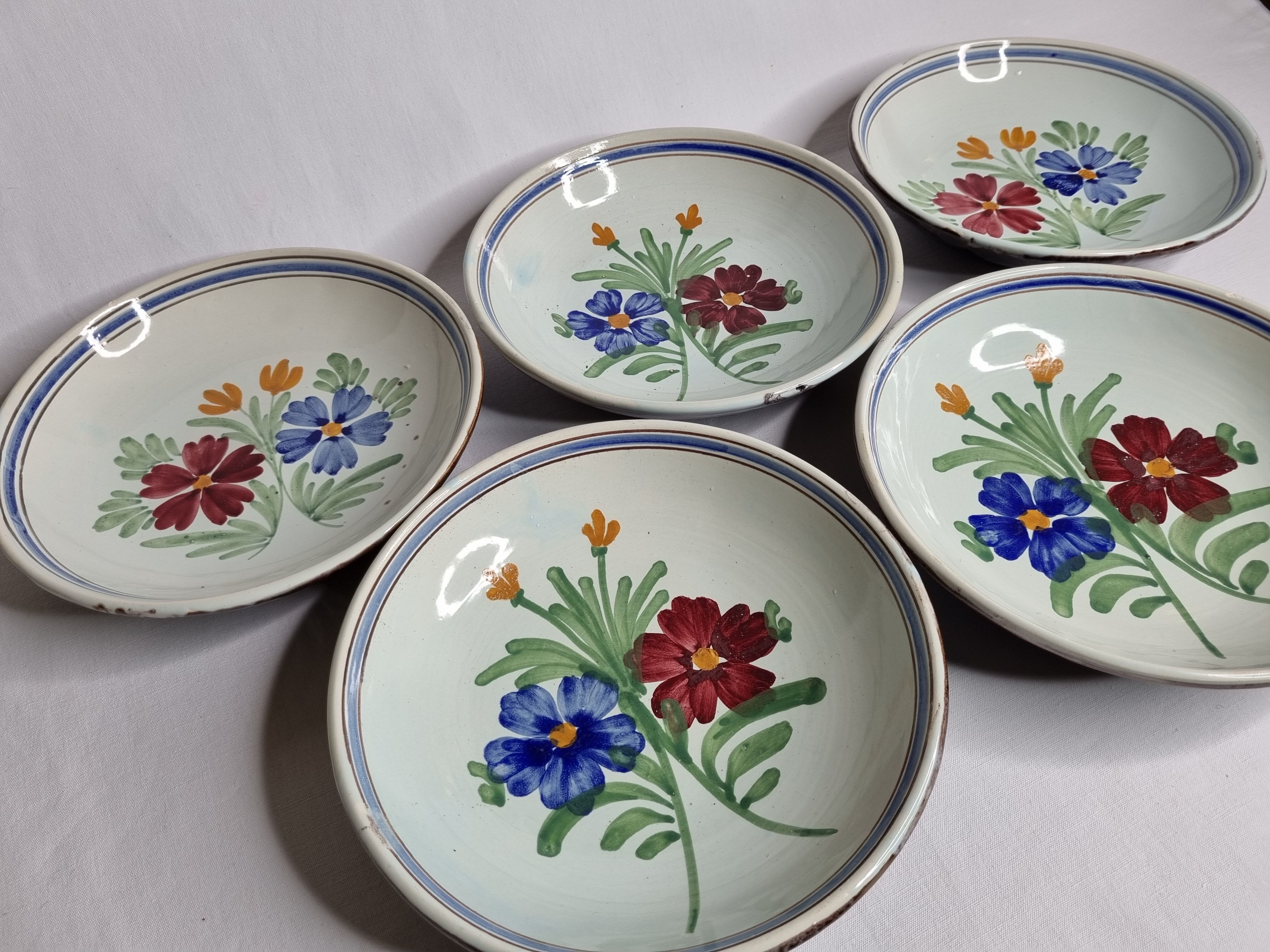 Set of five old hollow plates in glazed ceramic, nineteenth century, 23 cm