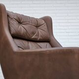 Années 1970, chaise pivotante danoise avec repose-pieds, bon état d'origine, cuir.