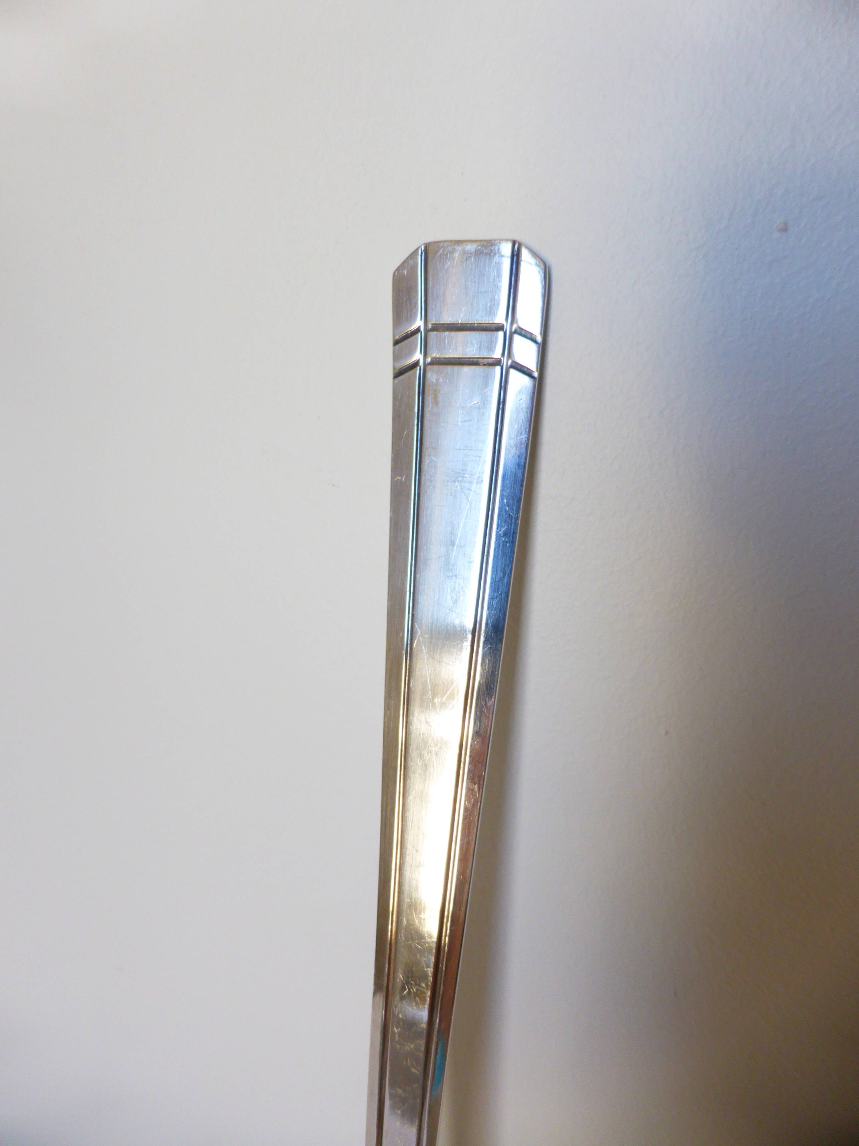 Shabby vintage silver-plated ladle.