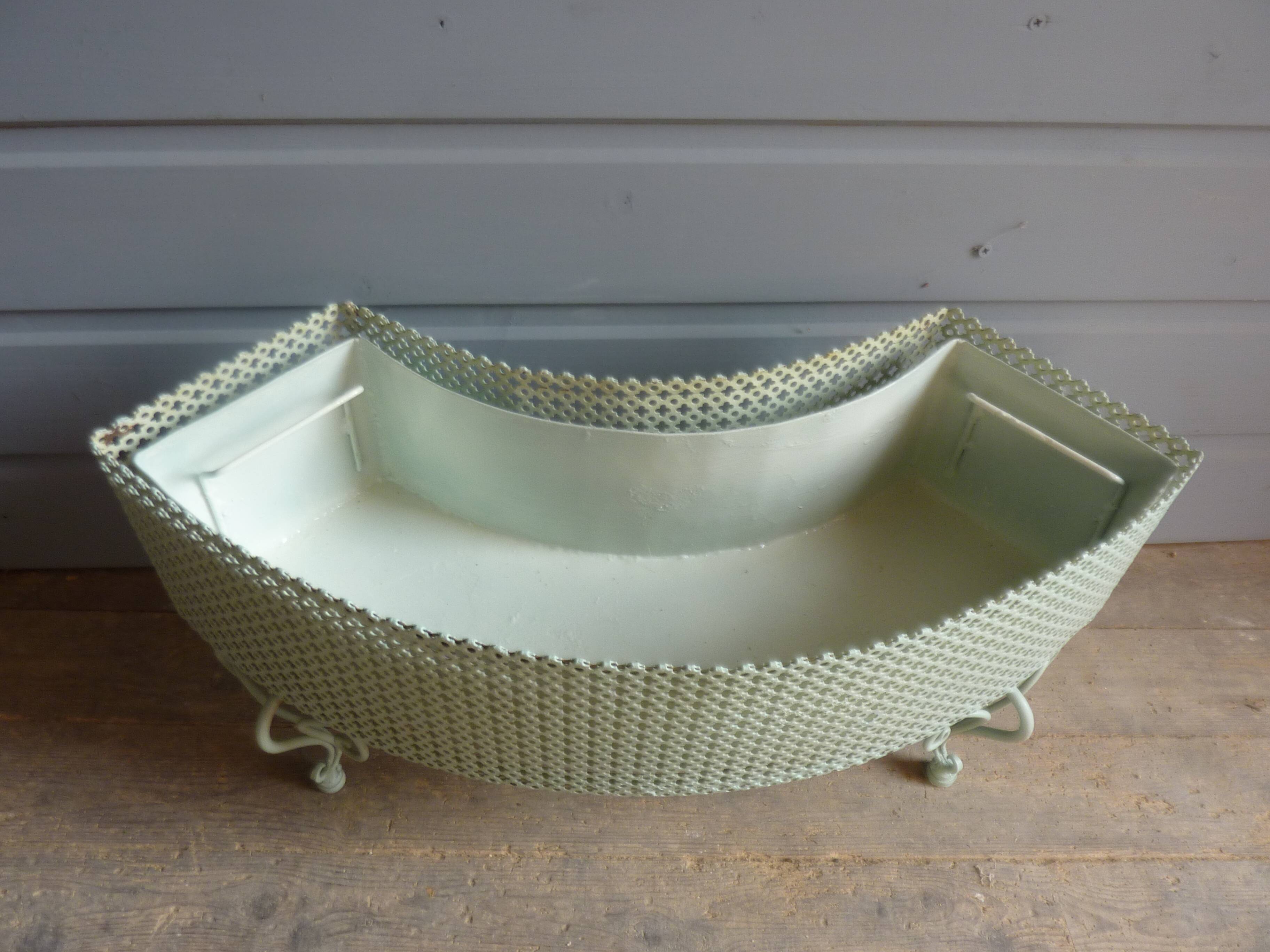 Perforated metal planter from the 1950s