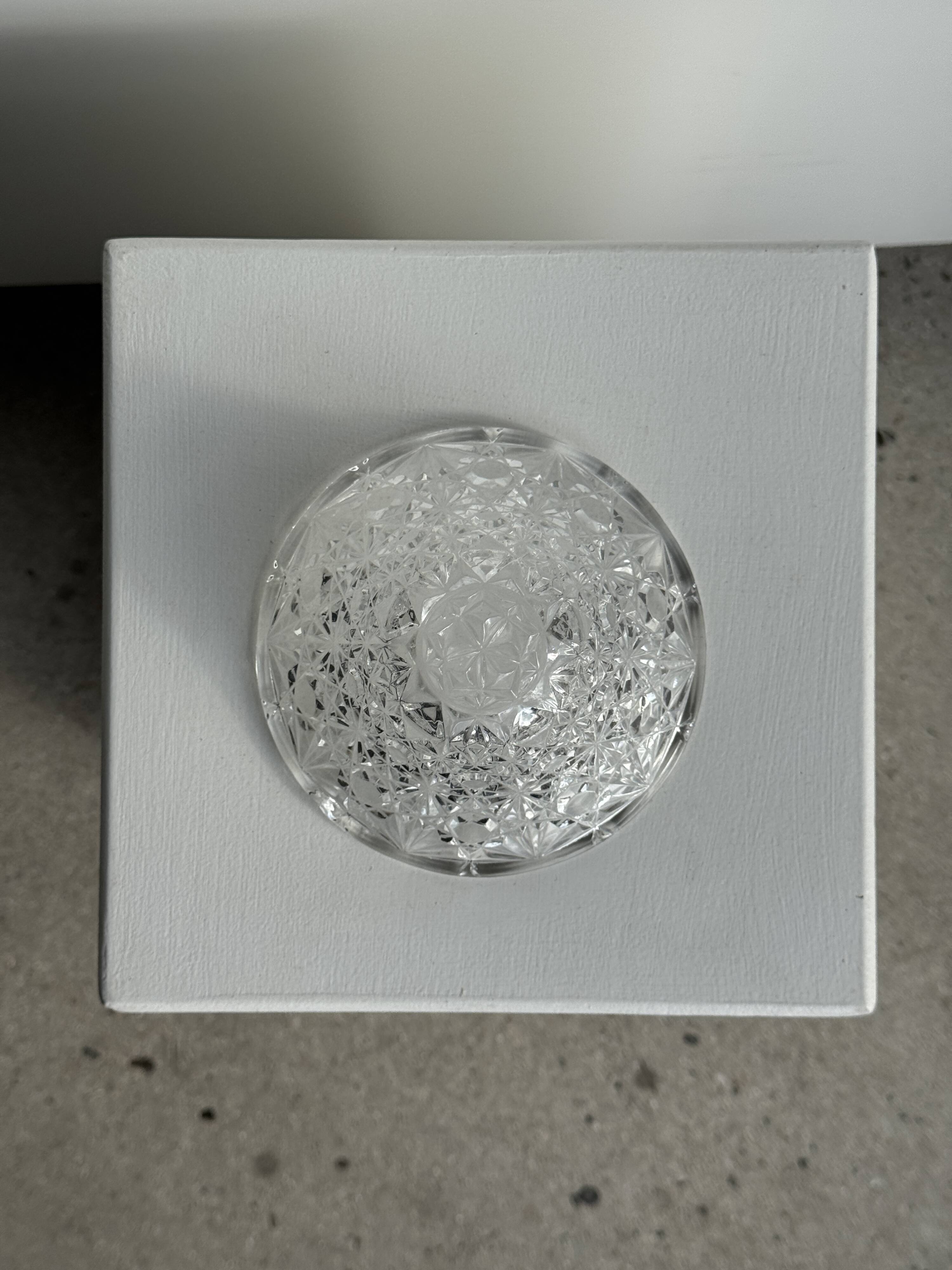 Small glass dish with vintage diamond points, a sparkle.