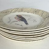 7 antique plates decorated with birds
