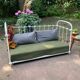 Wrought iron sofa bed with box spring.