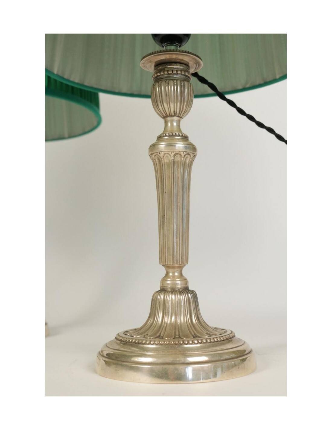 Candlesticks mounted as lamps, silver-plated bronze.