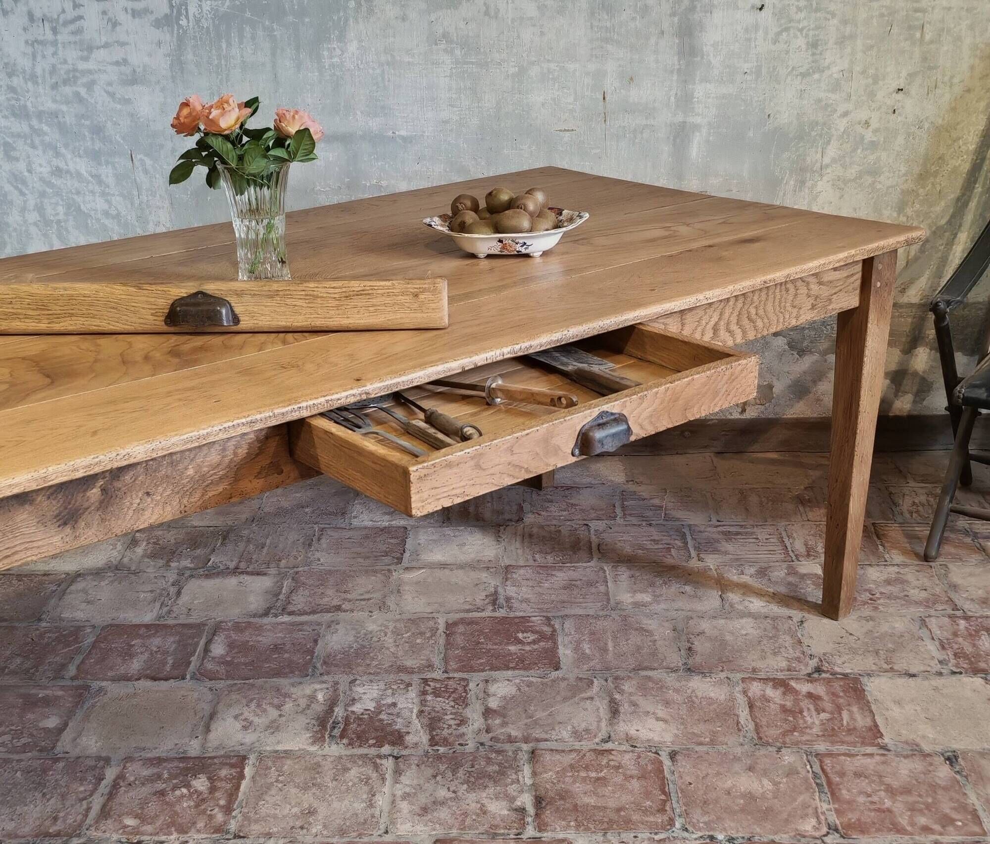 Large authentic farmhouse table made of solid French oak.
