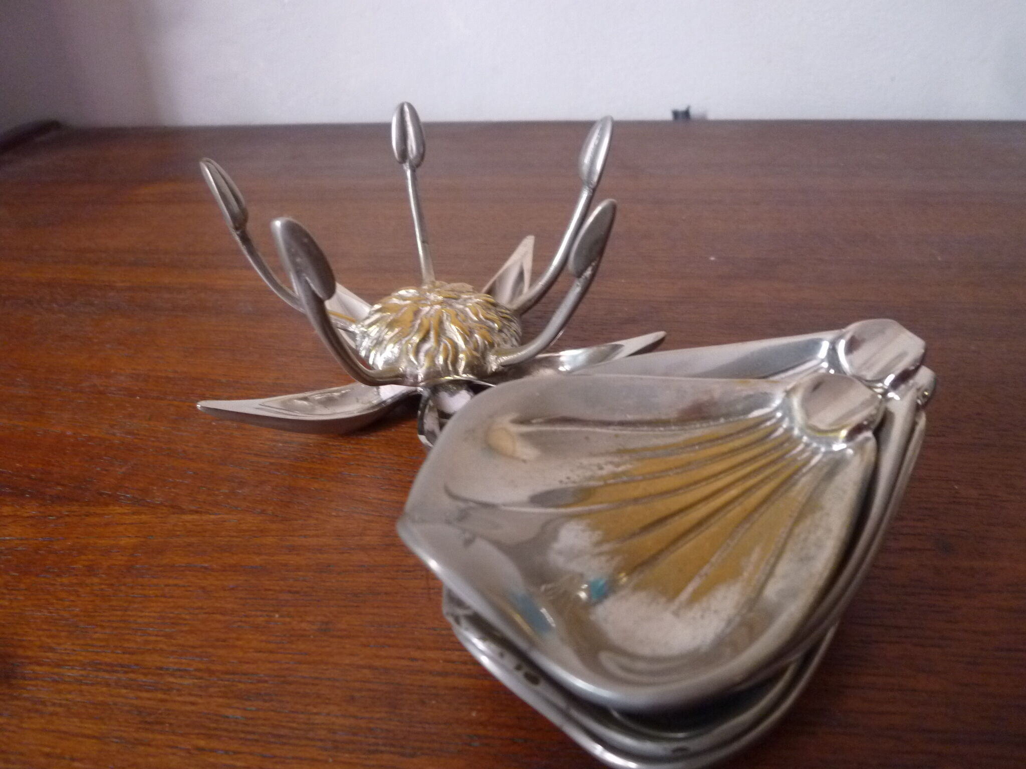 Individual ashtrays on decorative metal flower