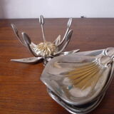 Individual ashtrays on decorative metal flower