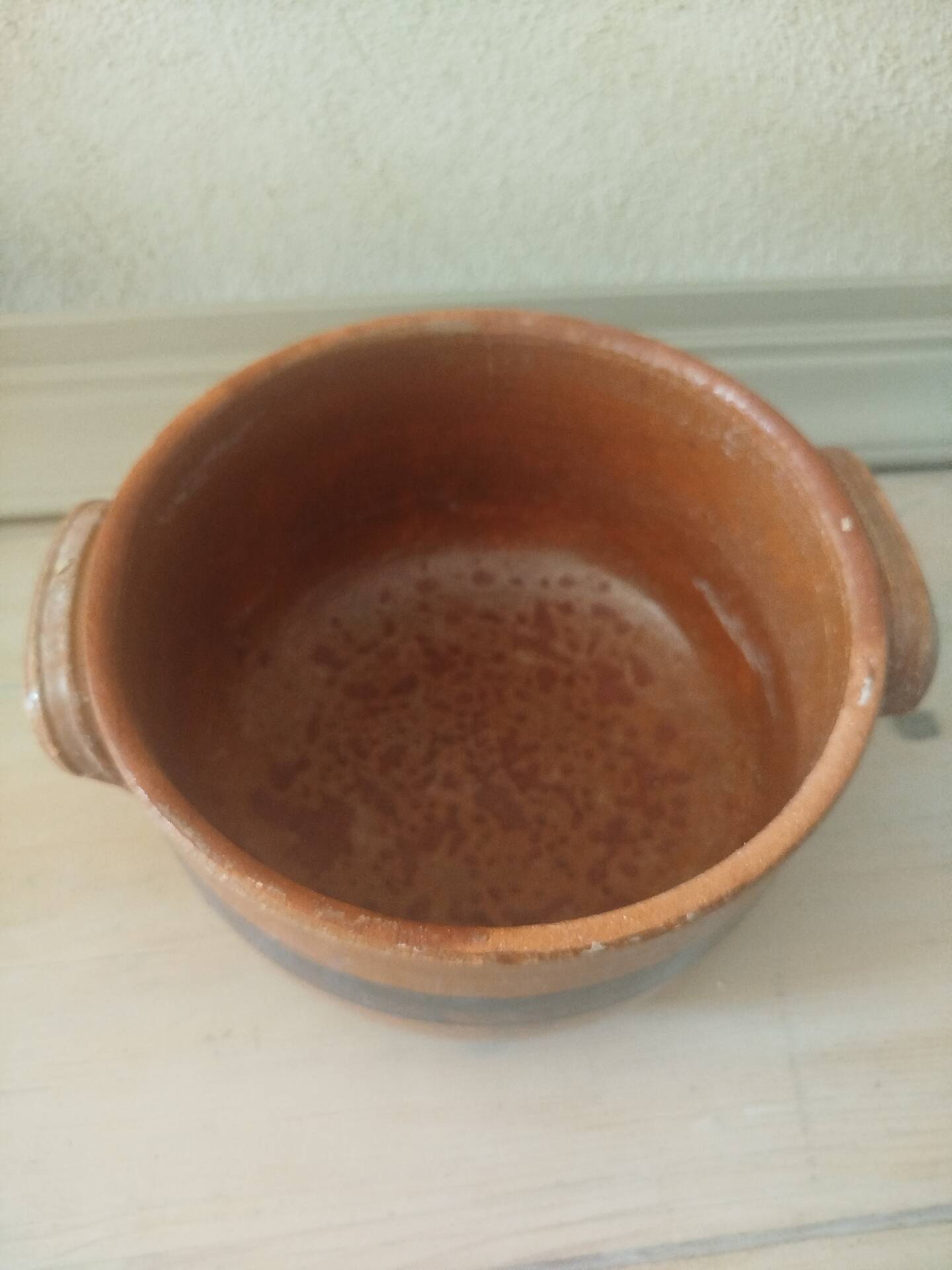 Old terracotta casserole