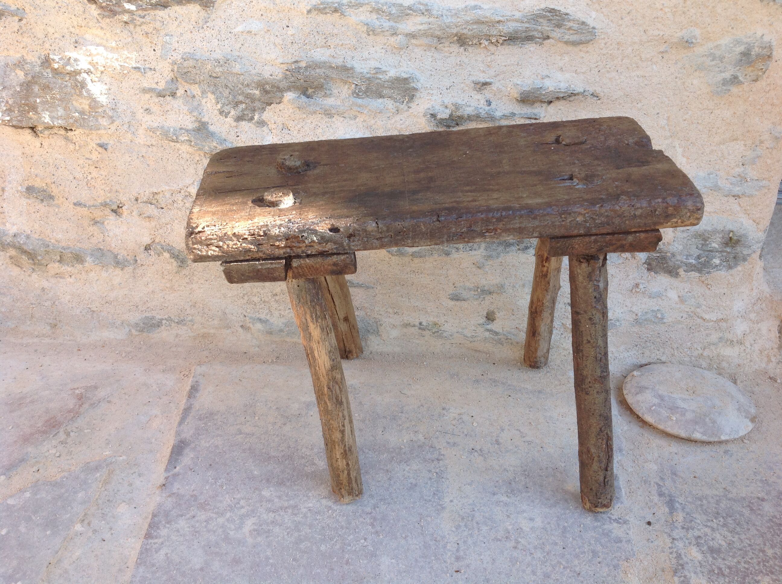 Brutalist milking stool in solid wood