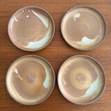 Set of vintage 1970s beige ceramic dinner plates.