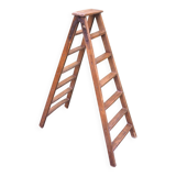 Old double wooden stepladder
