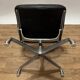Intermediate Eames chair from the 70s in leather.