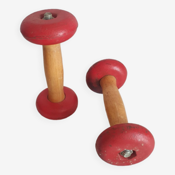 Pair of vintage wooden and cast iron dumbbells from the 50s and 60s