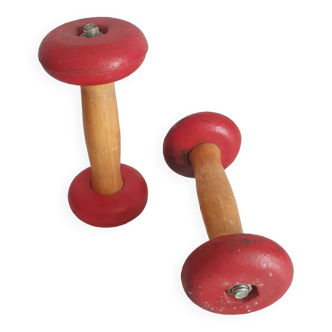 Pair of vintage wooden and cast iron dumbbells from the 50s and 60s