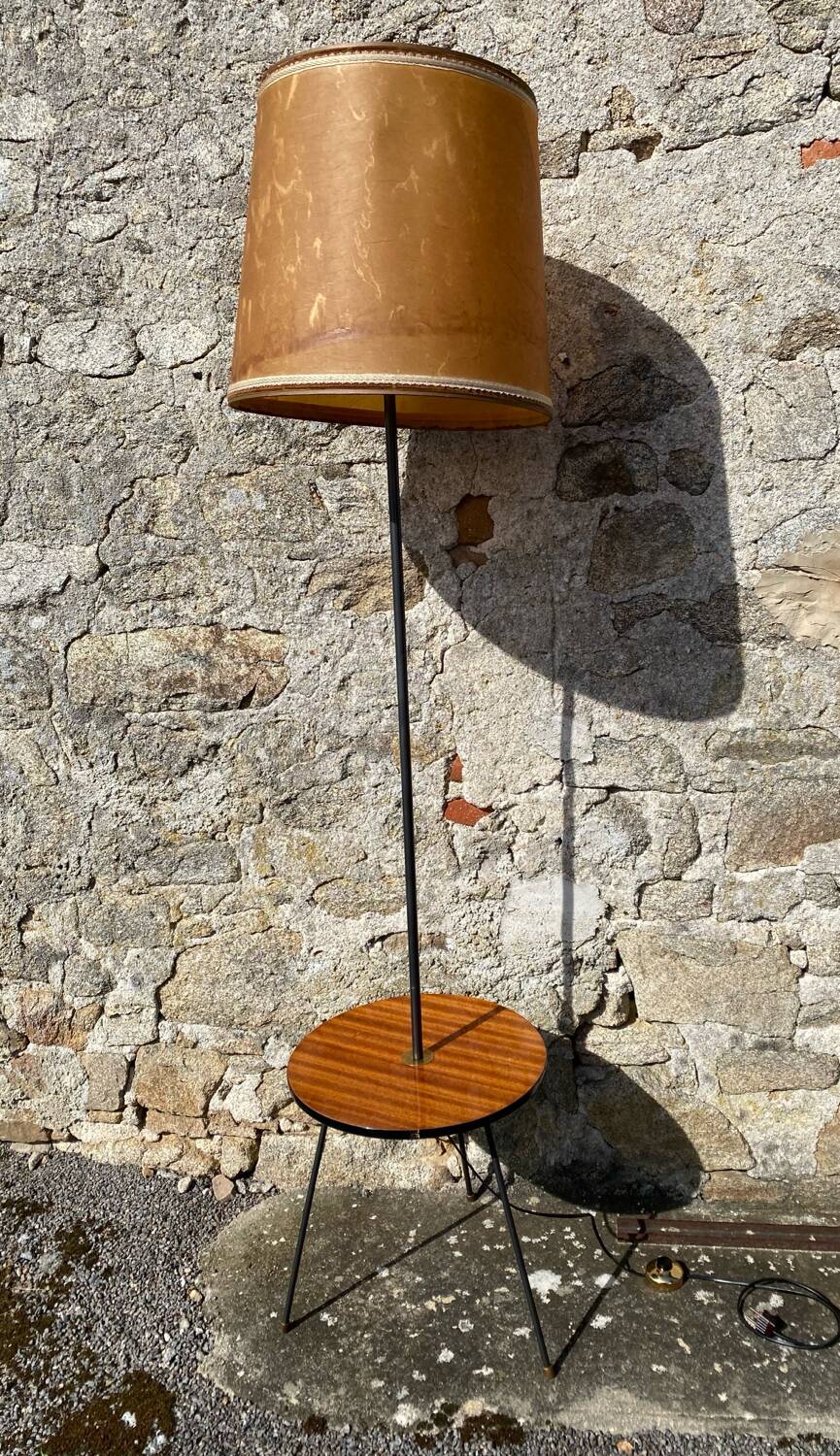 Vintage 1960s floor lamp with black tripod base and round varnished wooden shelf