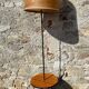 Vintage 1960s floor lamp with black tripod base and round varnished wooden shelf