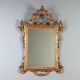 Antique carved and gilded wooden mirror, Italy, early 20th century.