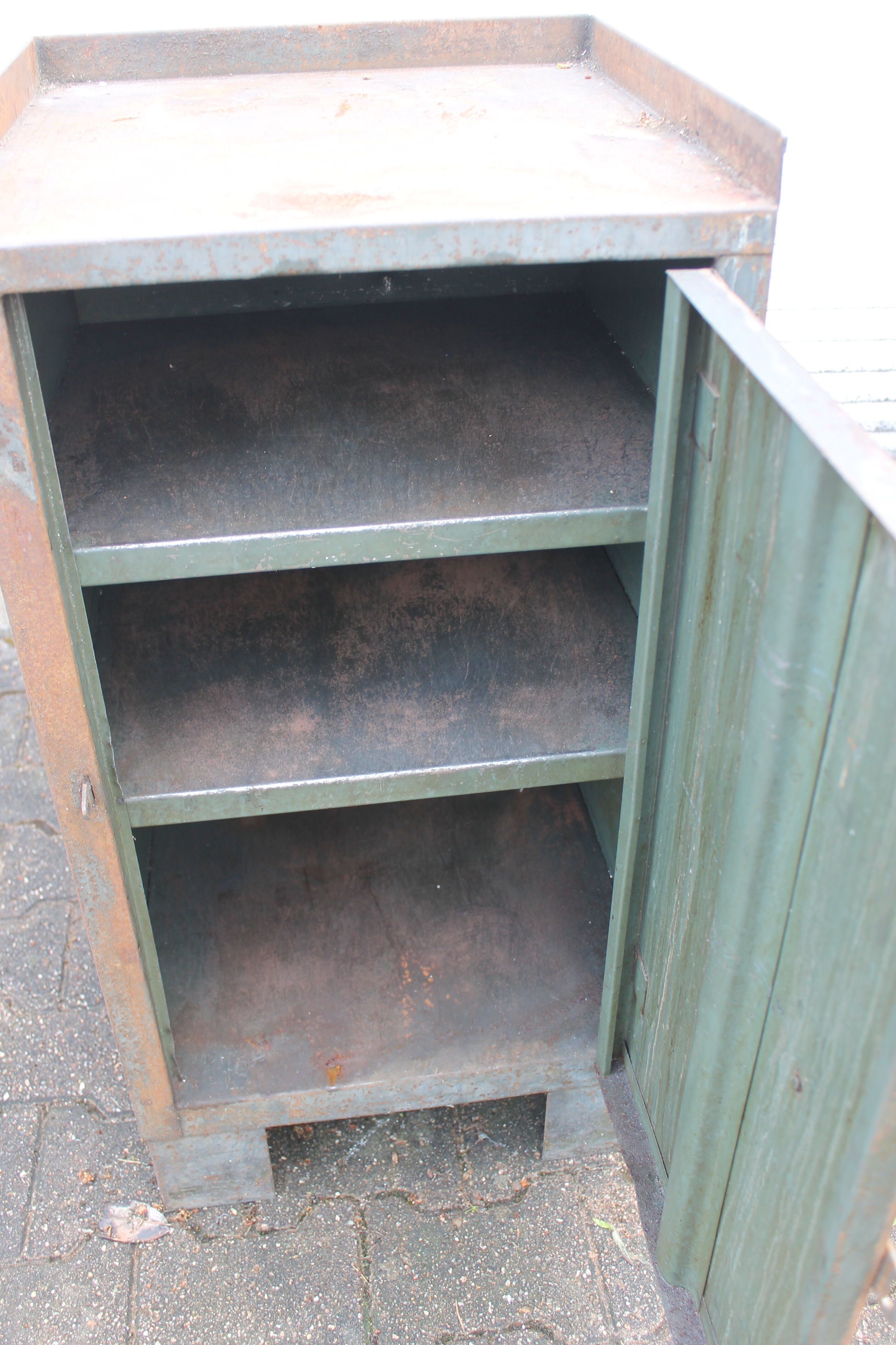 Grey industrial metal cabinet to be restored