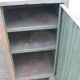 Grey industrial metal cabinet to be restored