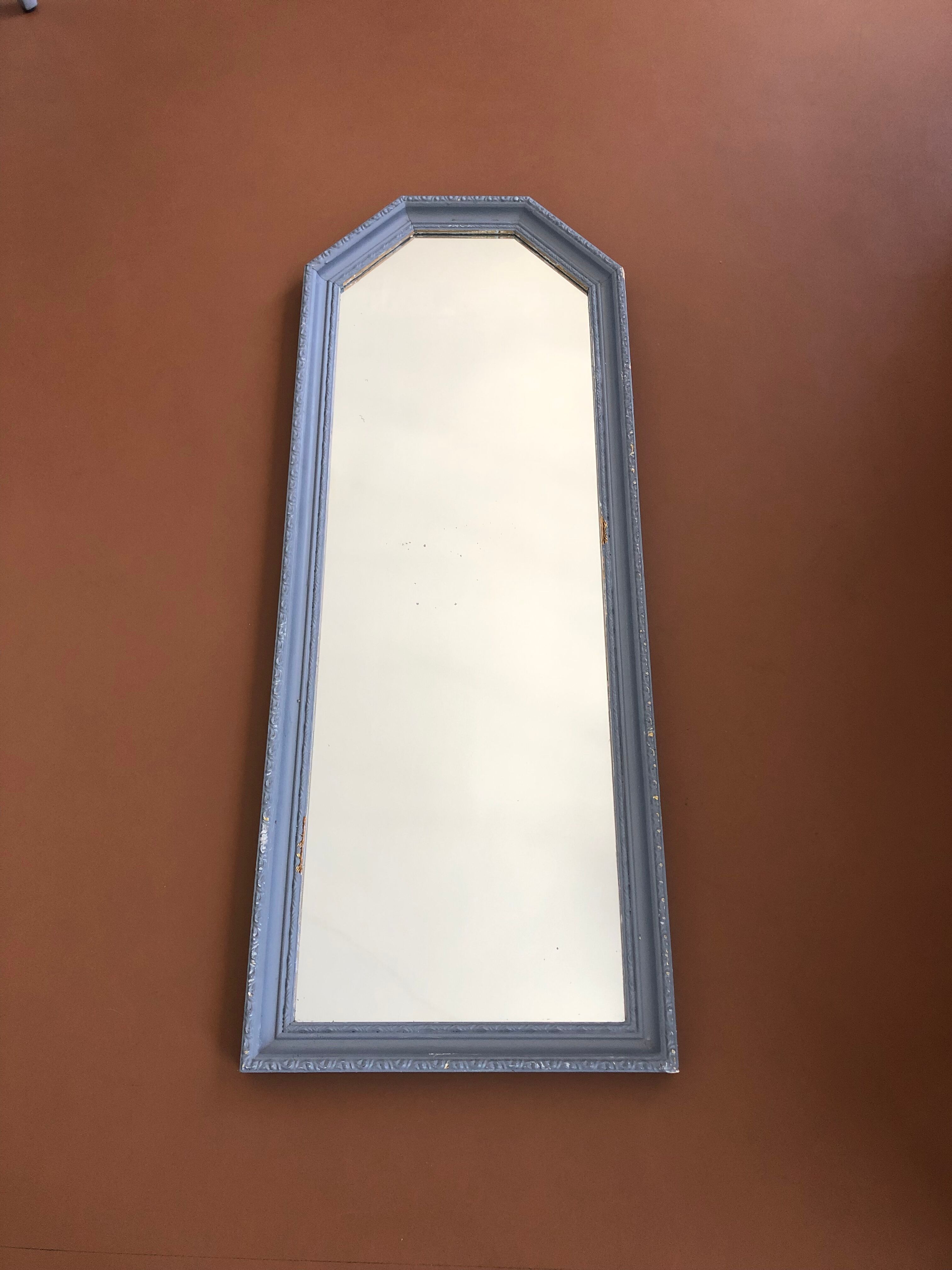 Old patinated mirror golden gray