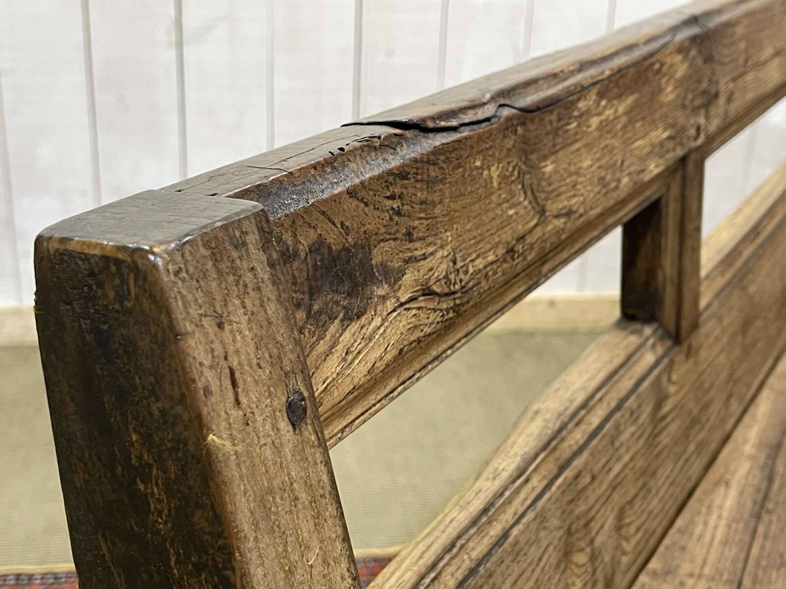 Rustic chestnut bench from the late 19th century.