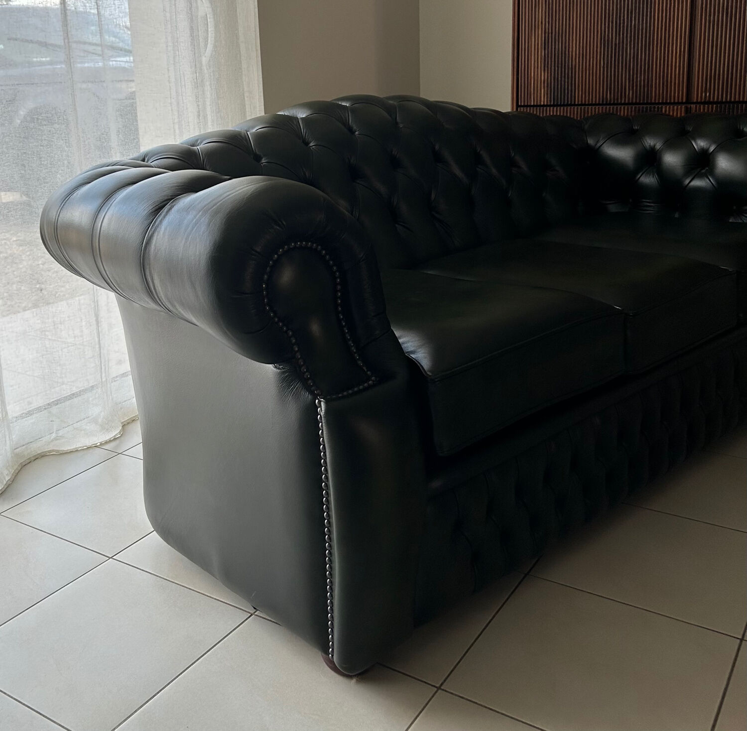 three-seater Chesterfield sofa