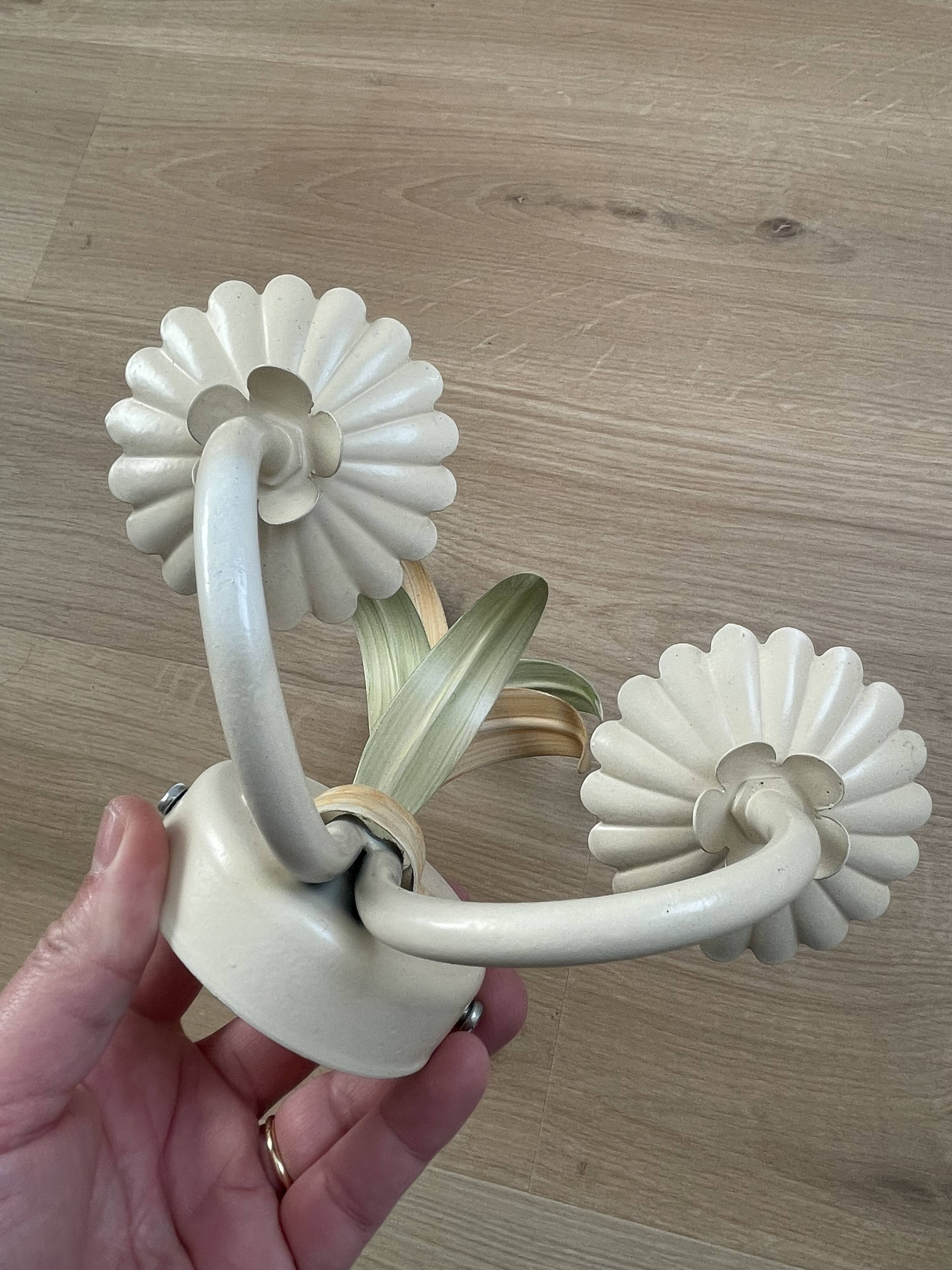 Vintage wrought iron wall sconce in the shape of a flower/leaf