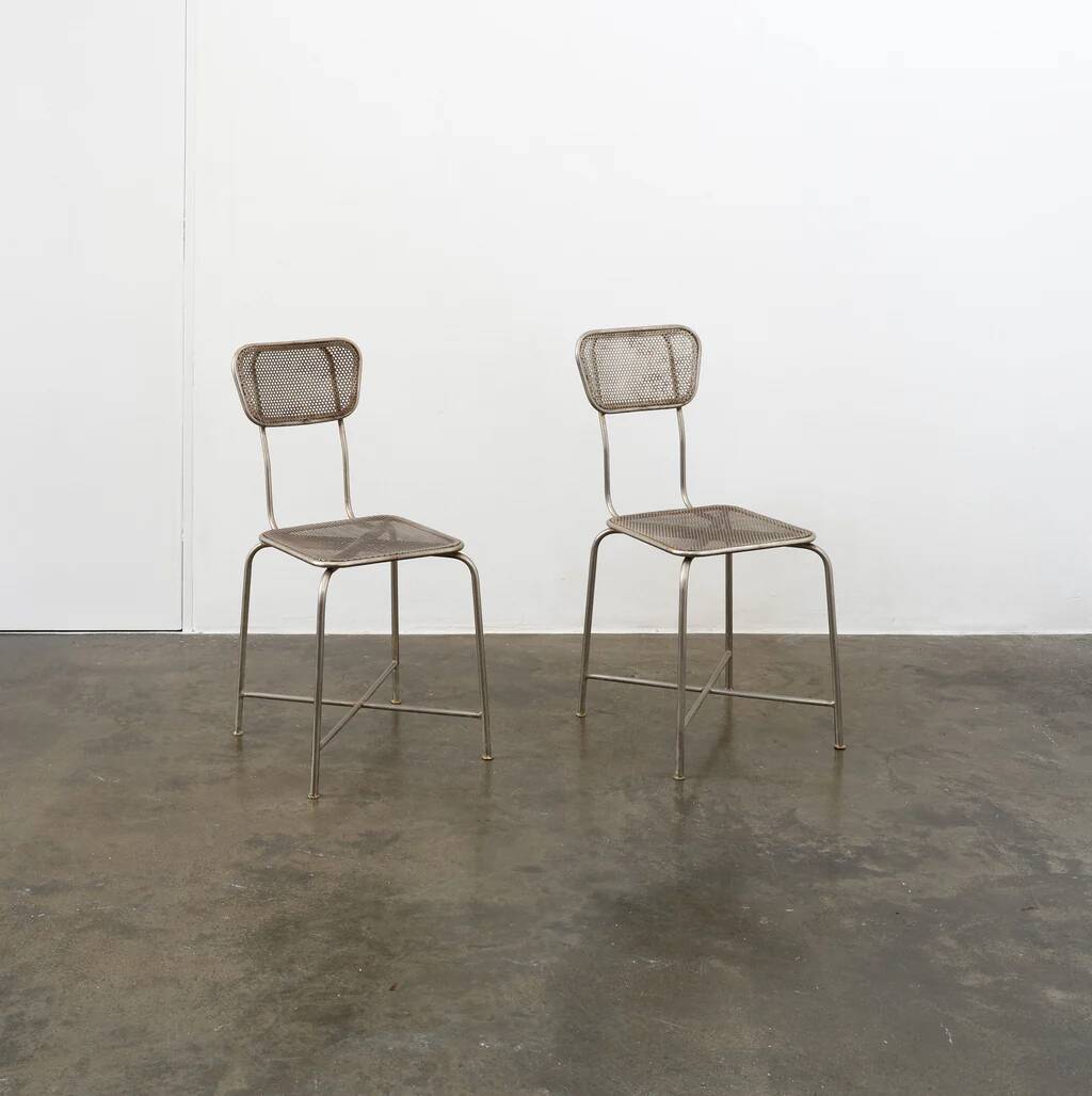 Vintage perforated metal chairs