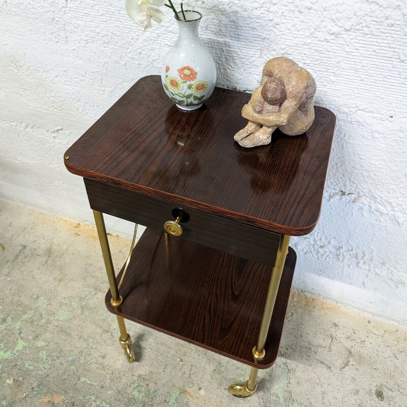 Vintage bedside table with wheels
