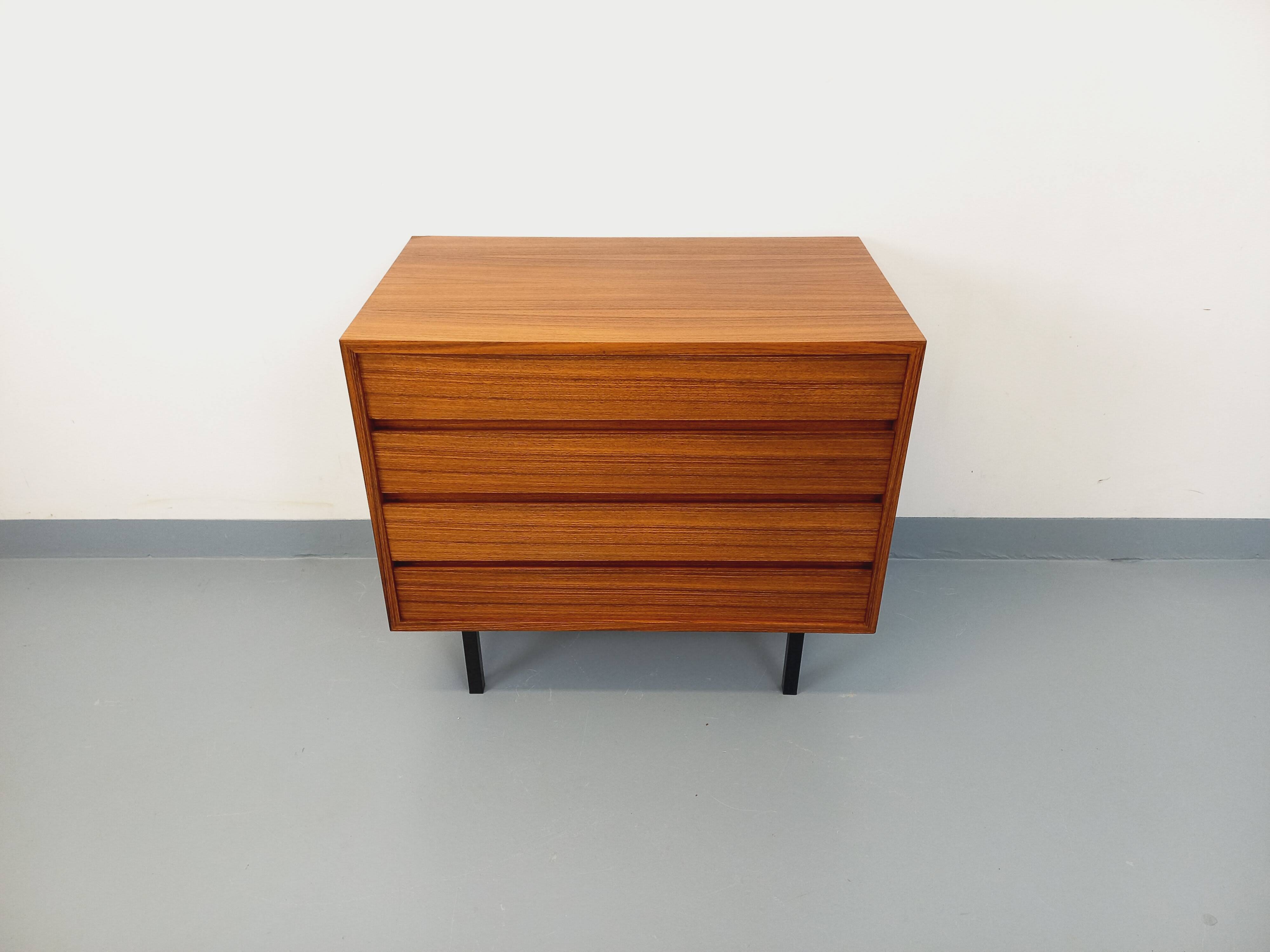 Vintage Scandinavian modernist chest of drawers in rosewood and black metal.