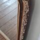 Antique Louis Philippe mirror with a pediment.