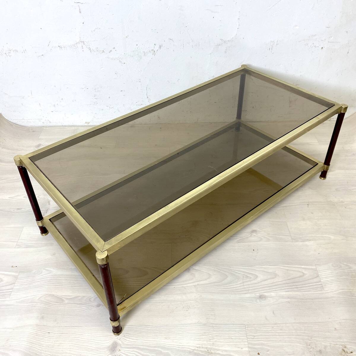 Vintage 1970s gold metal and smoked glass coffee table.