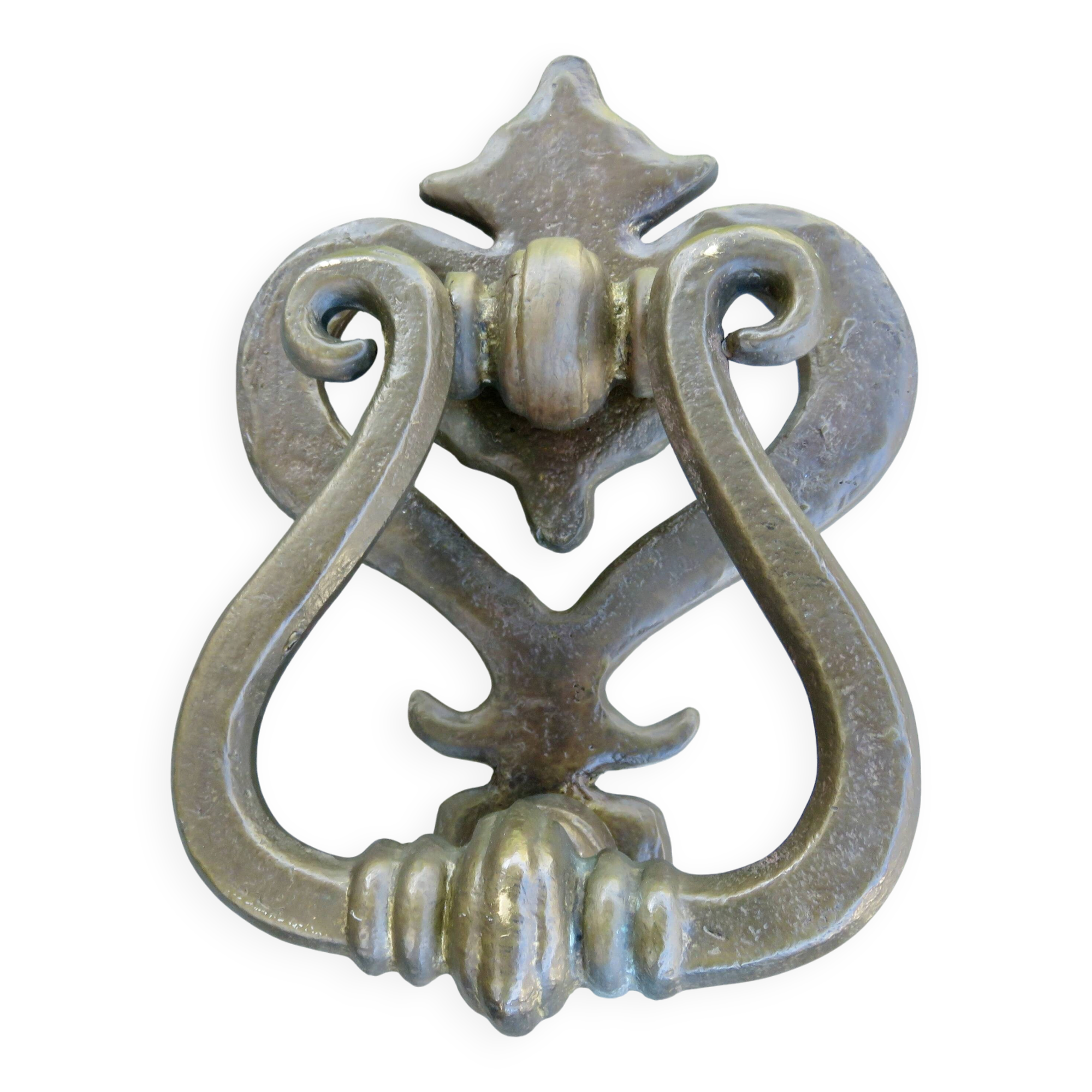 Impressive door knocker from the High Middle Ages in solid bronze.