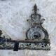 Antique brass fireplace set, bar and andirons, Napoleon I style.