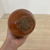 Green and brown ceramic pitcher