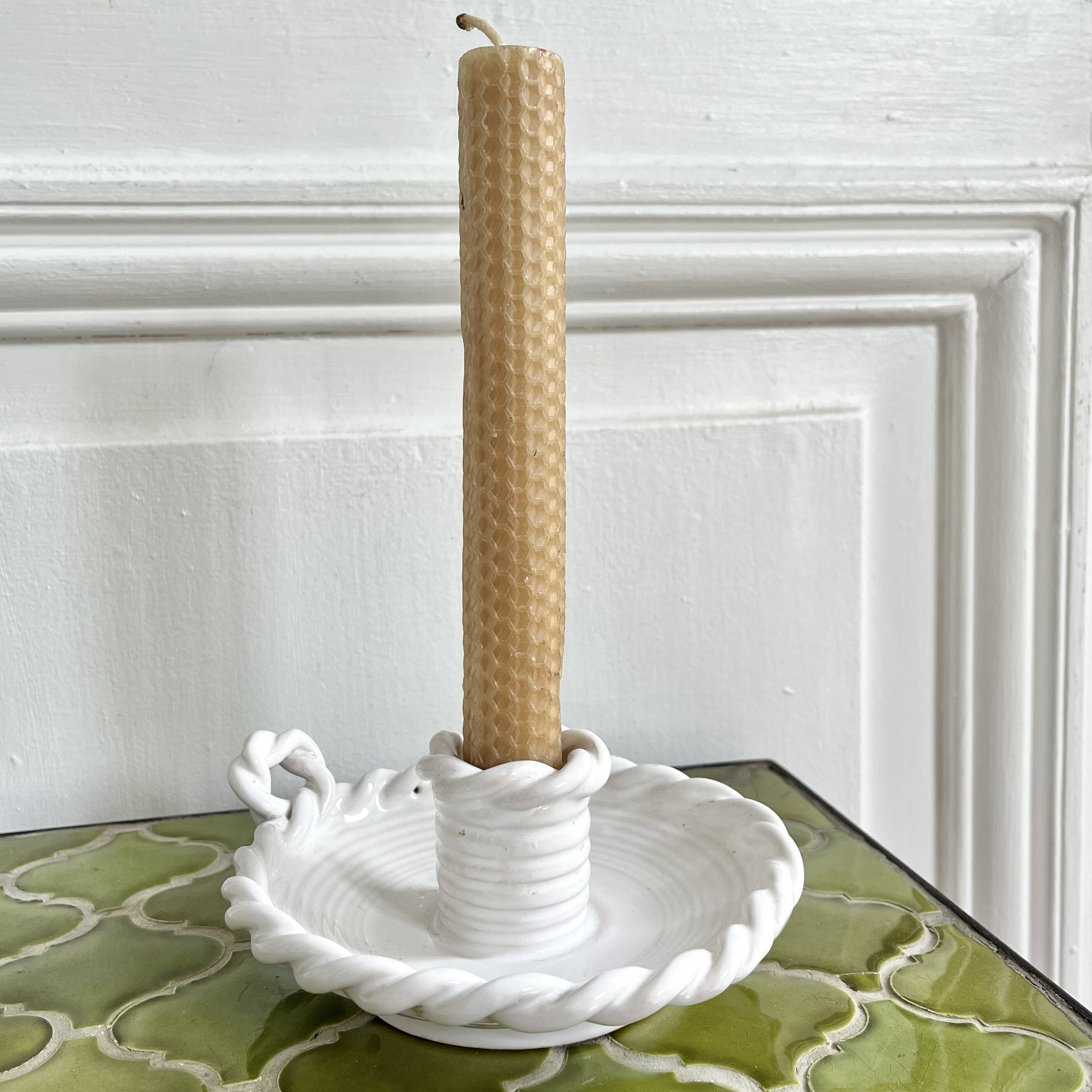 Hand-held candle holder with braided ceramic bowl