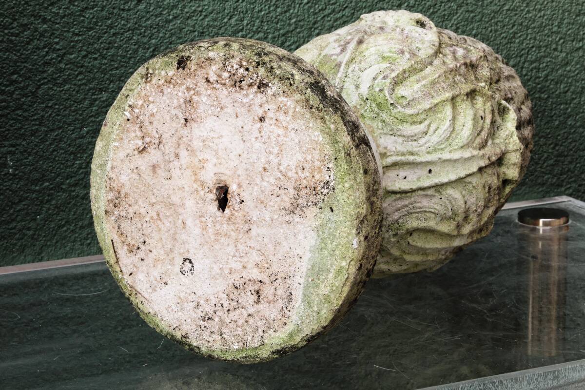 Pair of pine cones in reconstituted stone