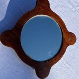 Wooden mirror with vintage rosettes