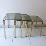 Series of nesting tables in smoked glass & rectangular golden brass