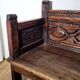 Antique carved solid wood bench from the early 20th century