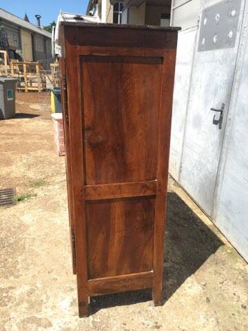 Old rustic farmhouse cabinet in fruit wood