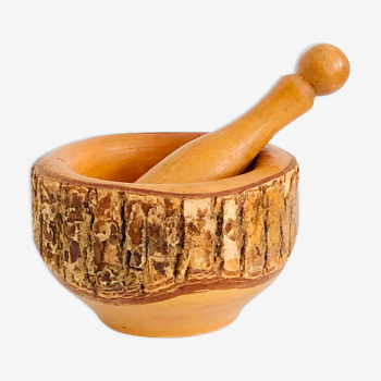 Vintage mortar and pestle made of natural wood