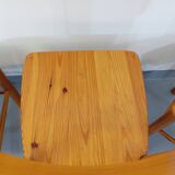 Suite of a round table with extension and 4 vintage pine chairs from the 60s and 70s