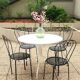 Salon de jardin, Table ronde blanche en fer forgé. et 4 chaises en acier lourd, noire d’origine