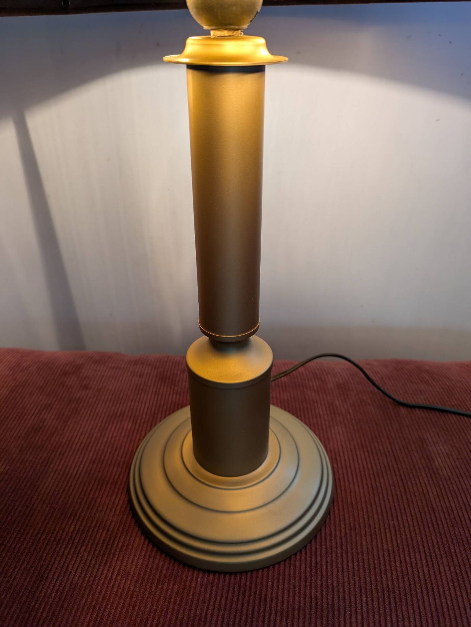 Brass lamp with asymmetrical velvet shade