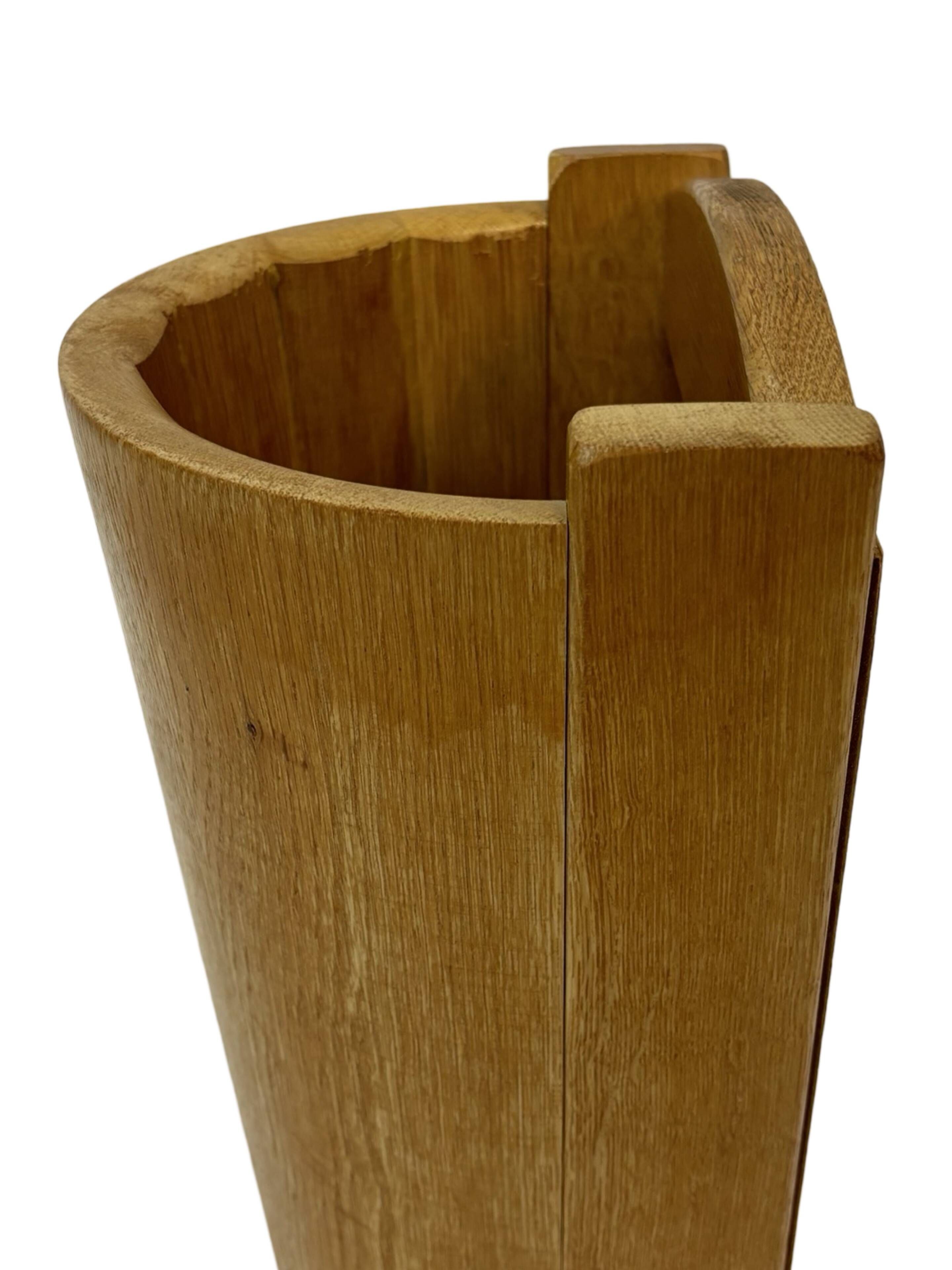 Vintage umbrella holder in oak basket storage design of the 1960s minimalist design
