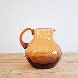 Antique amber glass pitcher