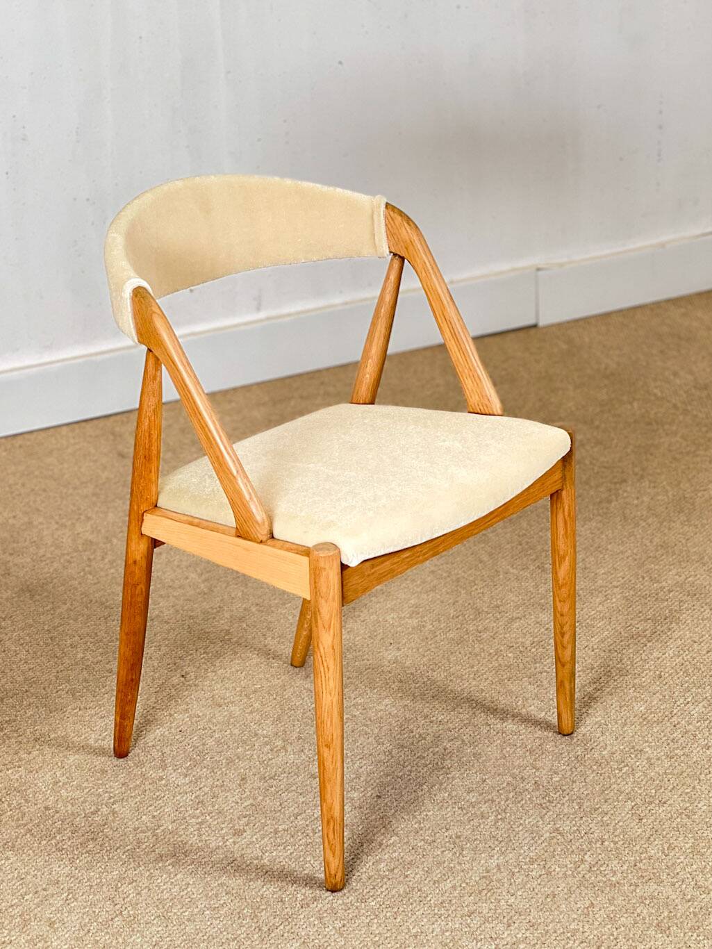 Set of four oak dining chairs by Kai Kristensen (Model 31)