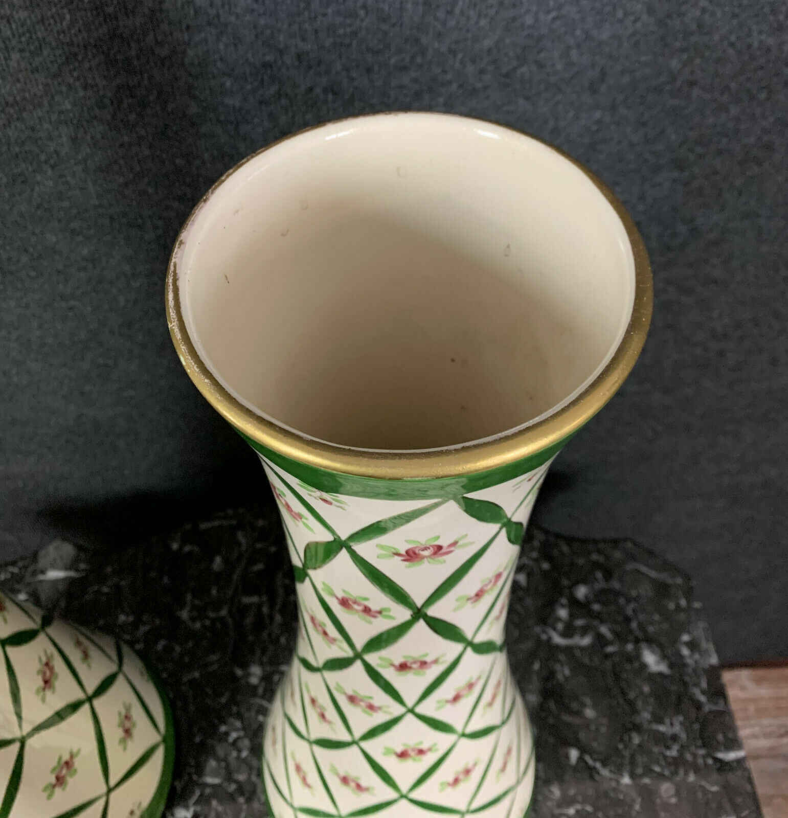Pair of cornet vases in fine earthenware decorated with flowers in a green mesh