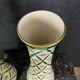 Pair of cornet vases in fine earthenware decorated with flowers in a green mesh